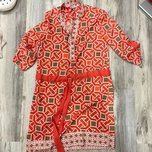 A  cute but elegant dress for any occasion needed. Worn once. A coral color!